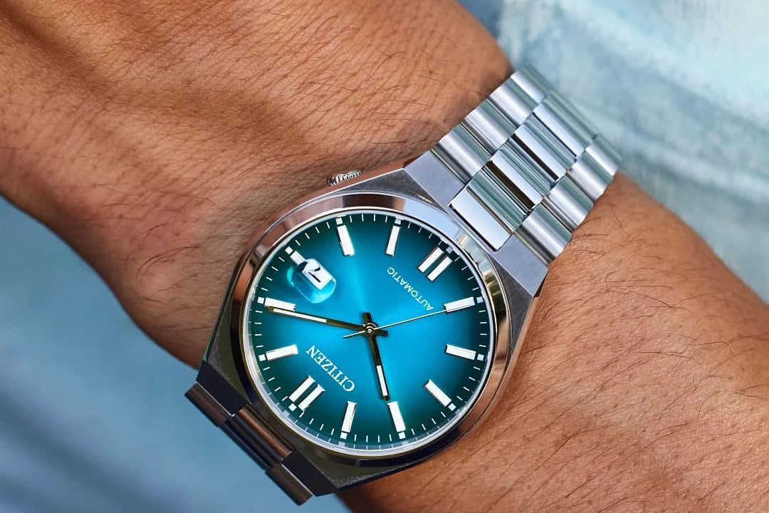 A Citizen Tsuyosa with a teal dial on the wrist