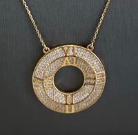 18kt Yellow Gold Necklace With18kt Yellow Gold Necklace With Atlas X Closed Circle Pendant Cubic Zirconia Cubic Zirconia