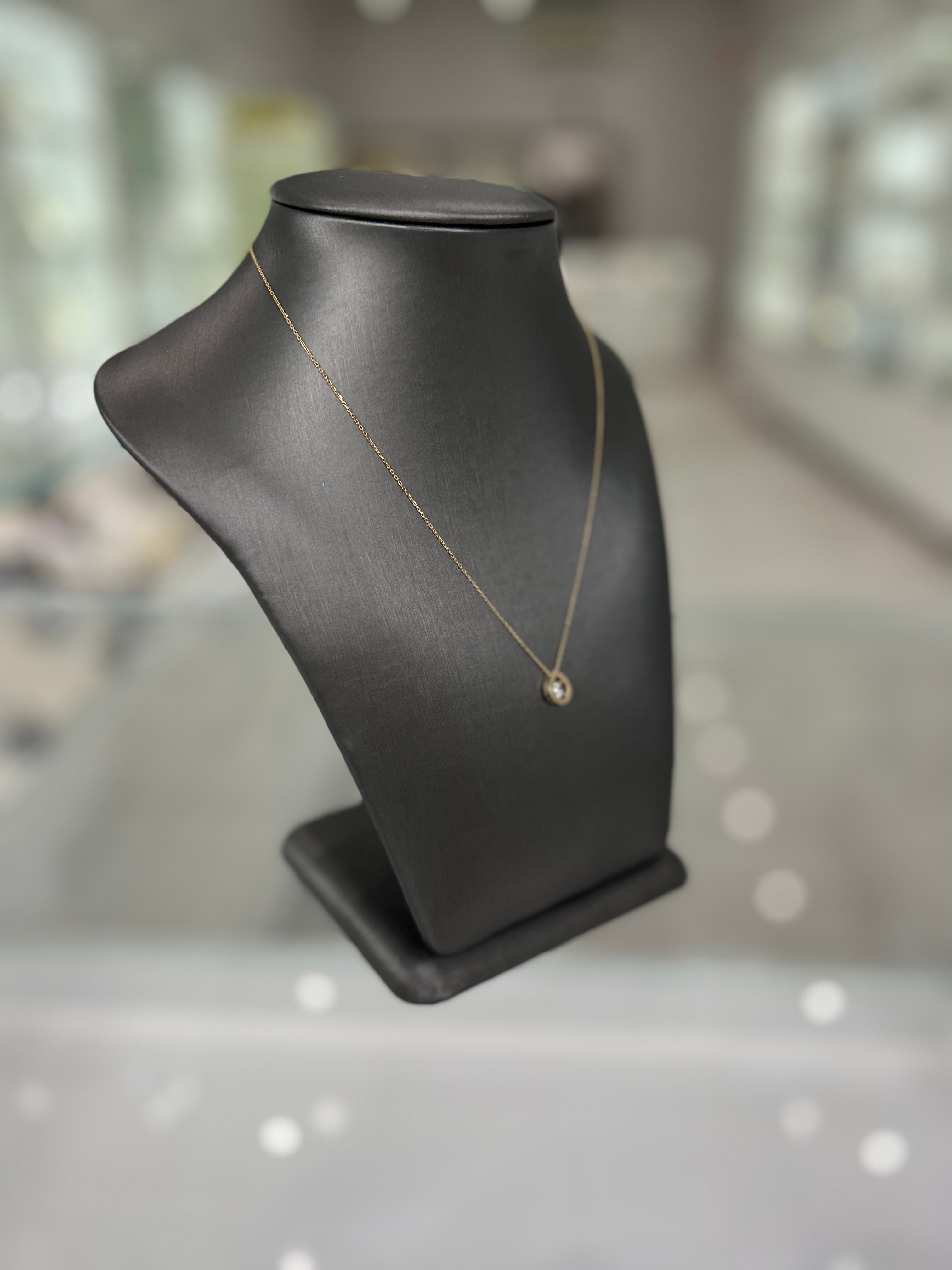 10kt Gold Small Round Cubic Zirconia Center Pear Shape Pendant Necklace