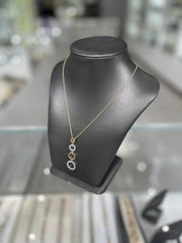 10Kt Four Round Two-Tone Drop Pendant With Cubic Zirconia