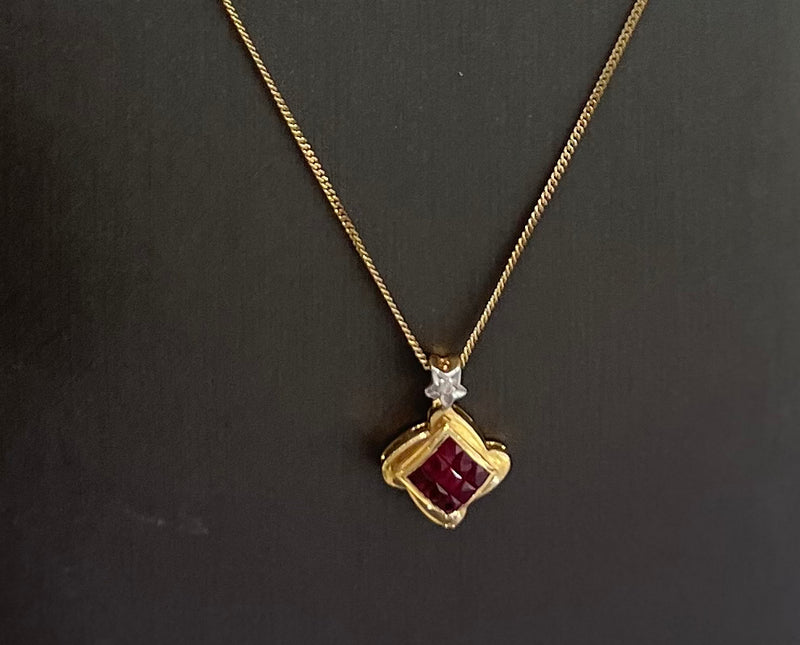 14kt Yellow Gold Ruby With Small Diamond Pendant. 10kt Yellow Gold Chain