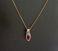 14kt Yellow Gold Ruby Diamond Pendant. 10kt Yellow Gold Chain