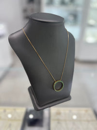 10kt Yellow Gold Emerald Round Pendant Chain